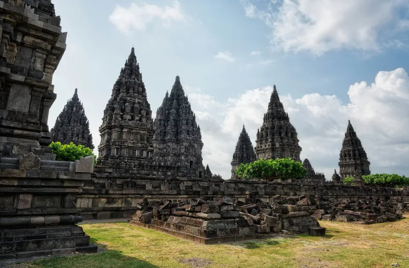 Prambanan Temple spires beside Borobudur Temple — comparing the two UNESCO sites
